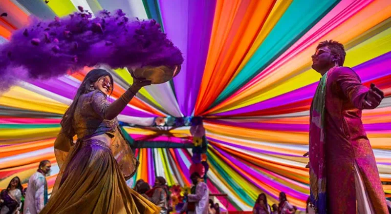 Holi Sundowner – A Rooftop Celebration for Two